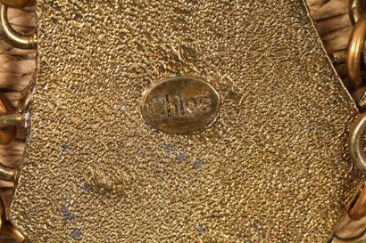 null CHLOE

Important collier en métal doré " chasse africaine ", signé, circa 90...