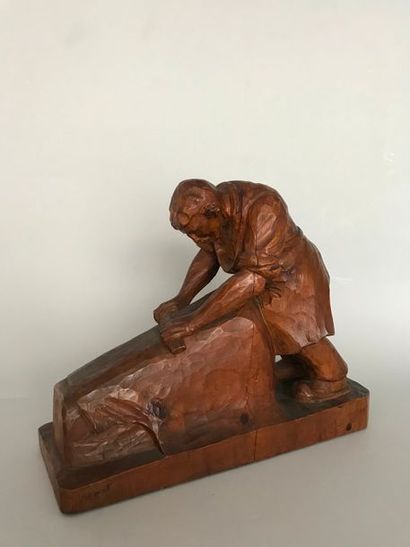 null Raymond BIGOT (1872-1953) 

Le tanneur 

Sculpture en bois signée sur le devant...