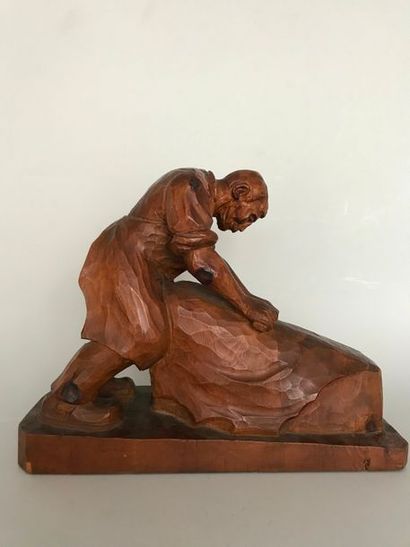 null Raymond BIGOT (1872-1953) 

Le tanneur 

Sculpture en bois signée sur le devant...