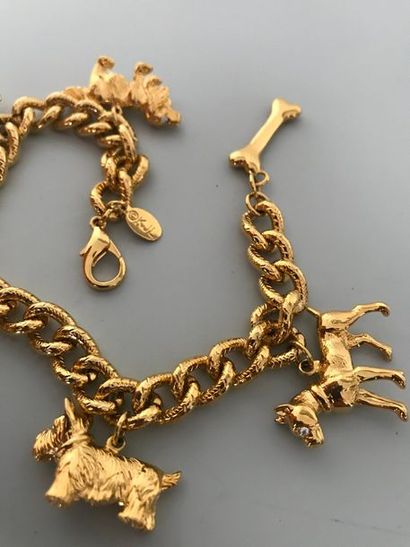 null KJL (KENNETH JAY LANE) 

Bracelet gourmette en métal doré à breloques chiens...