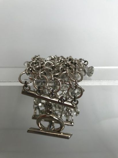 null PACO RABANNE 

Bracelet ruban en métal chromé et petits galets de verre transluvide...