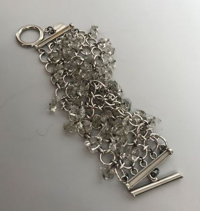 null PACO RABANNE 

Bracelet ruban en métal chromé et petits galets de verre transluvide...