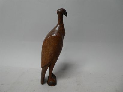 null Un cimier de coiffe vautour en bois sculpté polychrome, patine d'usage, Afrique,...