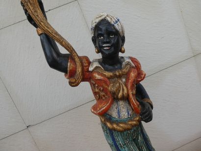 null Porte-torchère en bois sculpté et laqué à décor d'un personnage africain, Venise,...