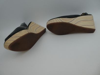 null MIU MIU, pair of wedge heels with back straps in black veni, S 38