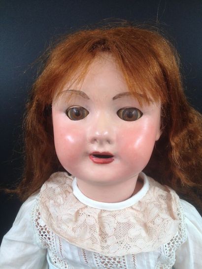 null S.F.B.J. 11, une poupée parlante à corps en bois laqué et tête en papier maché,...