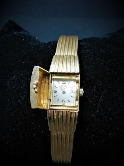 null ENICAR : montre de dame, boitier et bracelet rigide or godroné
Vers 1960
Poids...