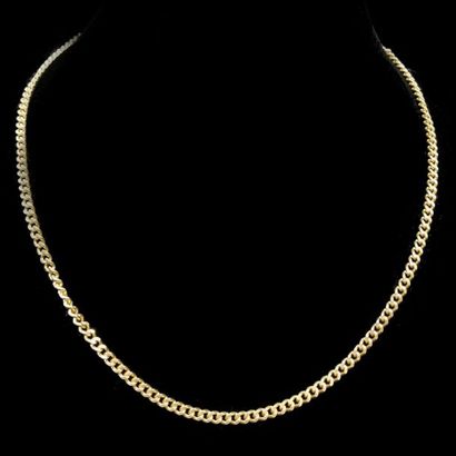 null Collier en or maille gourmette
Poids: 19.7 g- L: 62 cm 