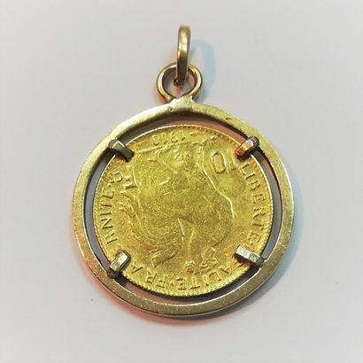 null Pendentif 10 Fr or 

Poids brut : 5.3 g