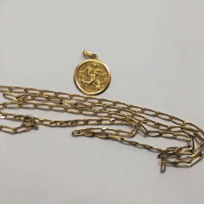 null Médaille religieuse 

Poids : 3 g on y joint une chaine en métal doré.