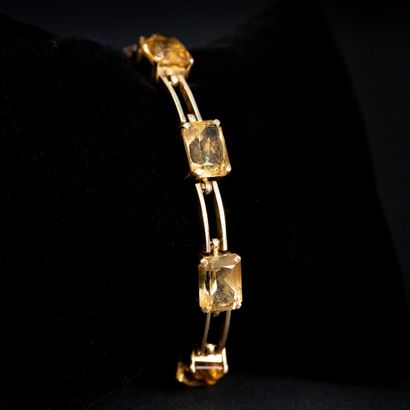 null Articulated bracelet with yellow stones, gold setting 

Gross weight : 28.8...