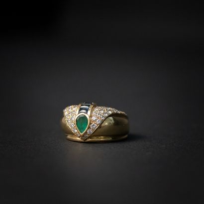 null Emerald ring in closed setting, calibrated sapphires, pavement of brilliant-cut...