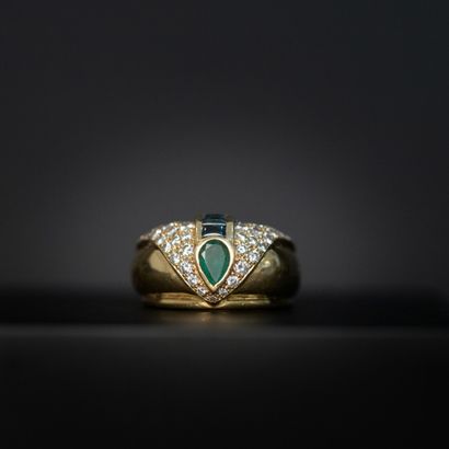 null Emerald ring in closed setting, calibrated sapphires, pavement of brilliant-cut...