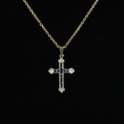 null Cross pendant with calibrated sapphires and diamonds 8/8, gold setting, and...