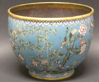 null Large bronze and polychrome cloisonné enamel bowl on a blue background decorated...