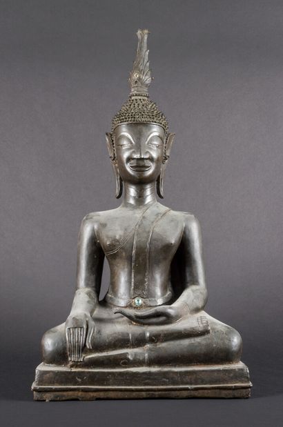 null Statue representing a seated Buddha in the position "of the earth to witness"...