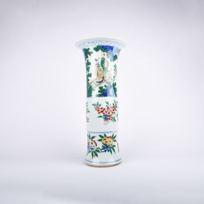 null A Gu vase in porcelain and enamels of the green family, decorated with characters,...