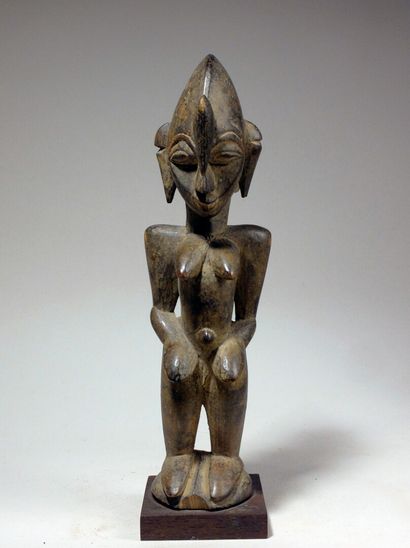 null Statuette Sénoufo

Statuette féminine bien représentative de la statuaire Sénoufo,...