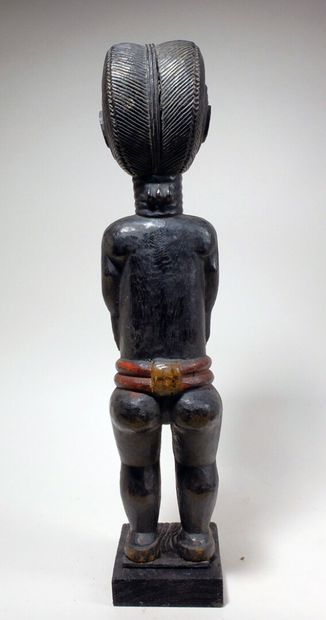 null Statuette Baoulé (Côte d'Ivoire)

Statuette féminine les bras le long du corps,...