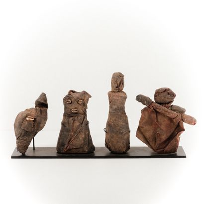 null ADJA - BENIN 

Set of four small swaddled fetishes forming an altar (character,...