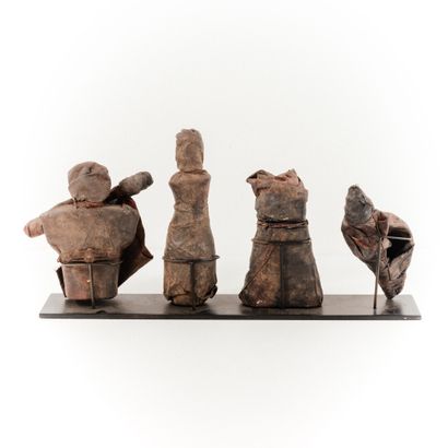 null ADJA - BENIN 

Set of four small swaddled fetishes forming an altar (character,...