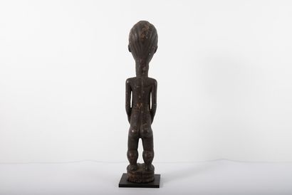 null BAOULE - COTE D'IVOIRE 

Statuette féminine se tenant le ventre, scarification...