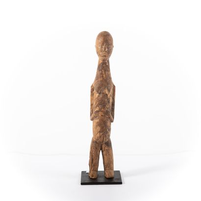 null LOBI BURKINA FASO 

Beteba, female figure with arms crossed holding her stomach...