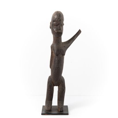 null LOBI- BUKINA FASO 

Female figure with arm raised to the left 

patina of u...