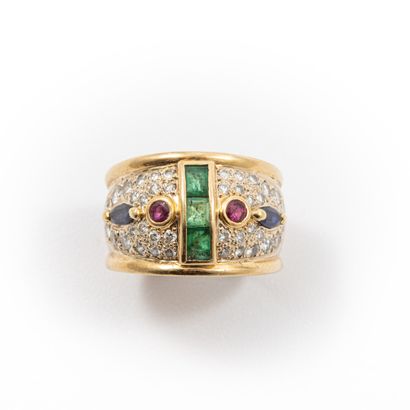 null Ring paved with brilliant-cut diamonds, emeralds, sapphires and rubies.

Gross...