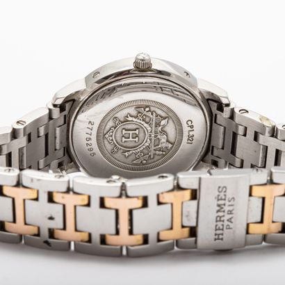 null HERMES "Clipper

Ladies' watch, 27mm case and bracelet in steel and gilded metal,...