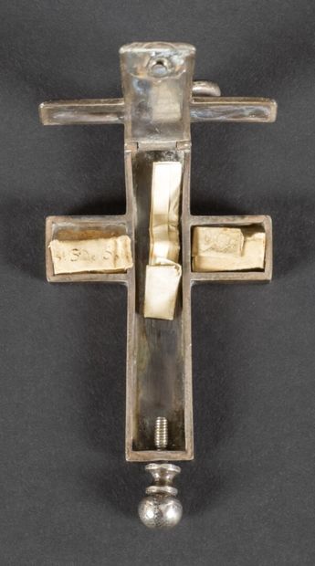 null Breton cross reliquary pendant in silver engraved with religious motifs. The...
