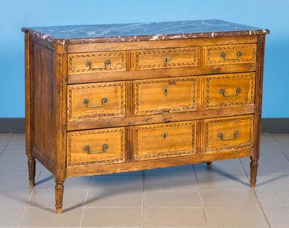 null Walnut chest of drawers opening to three drawers.

Marble top.

Louis XVI period

H...
