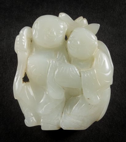 null Celadon jade pendant, representing the Hoho brothers holding a lotus flower....