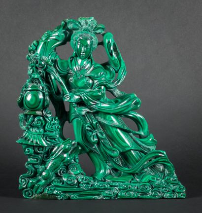 null Malachite group representing a young girl with a lantern.

China, around 1960.

H...