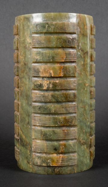 null Cong cylinder, symbolizing the earth, in green jade slightly veined with rust...