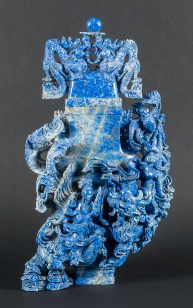 null Important lapis lazuli covered vase carved with dragons and divinity.

China,...
