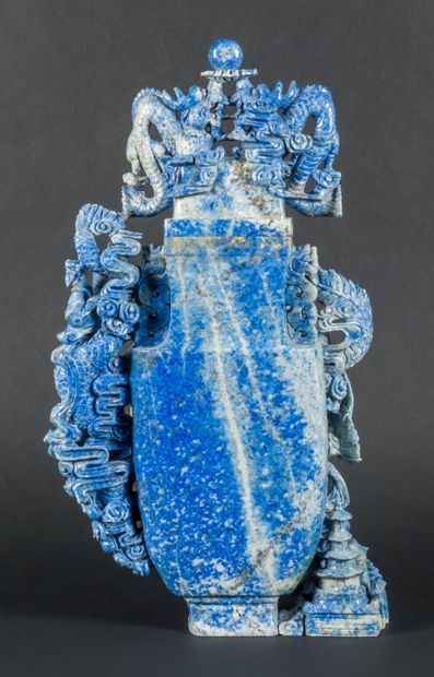 null Important lapis lazuli covered vase carved with dragons and divinity.

China,...