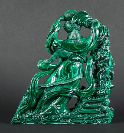 null Malachite group representing a young girl with a lantern.

China, around 1960.

H...