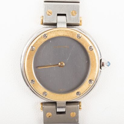 null CARTIER-Paris.

Lady's watch, gold and steel case and bracelet, quartz movement...