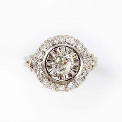 null Daisy ring, central old cut diamond 0.50 carat approx., surrounding 8/8 cut...