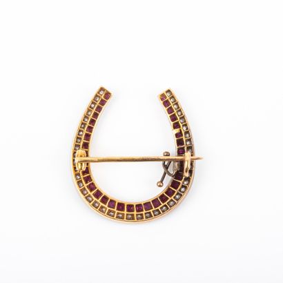null Horseshoe brooch, old diamonds and calibrated rubies 

Beginning of XXth century...