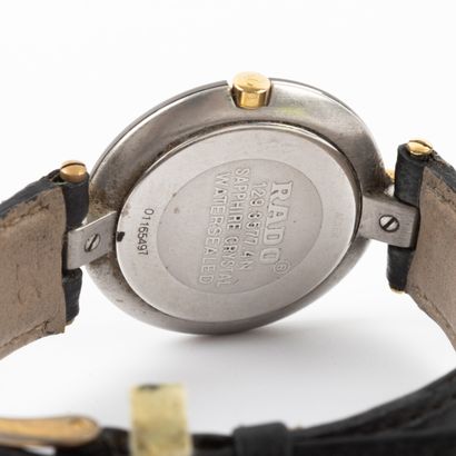 null RADO 

Lady's watch, case 30 mm steel, quartz movement

bracelet.

scratches...