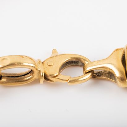 null Gold bracelet, fancy mesh.

Weight: 22.7 g - - L: 23 cm - Shock