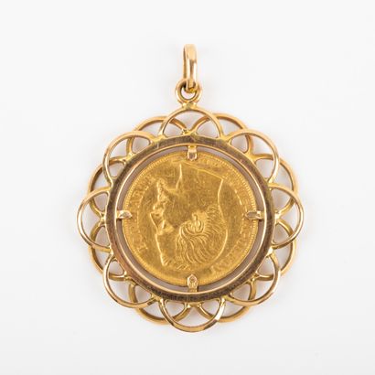 null Coin of 20 Fr gold mounted in pendant 

weight : 12.8 g