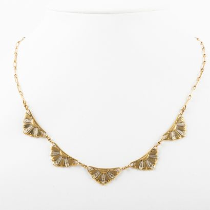 null Necklace drapery two golds 

Weight: 9 g - L: 46 cm - accident .