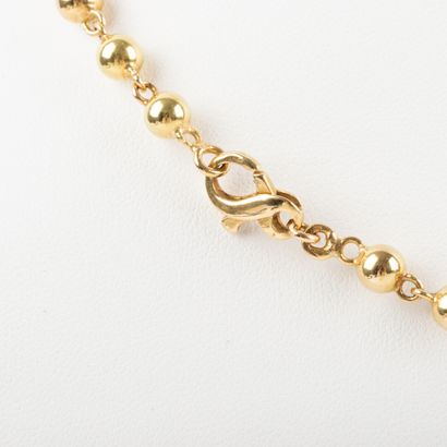 null Choker necklace in gold with decoration of balls diam 4.7 to 8.7 mm approximately....