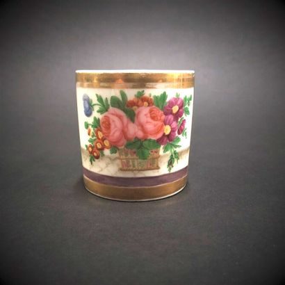 null Paris



Porcelain cup of form litron with polychrome decoration of flowers...