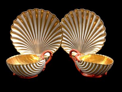 null Paris



Two porcelain cups and their saucer in the shape of shell with gold...