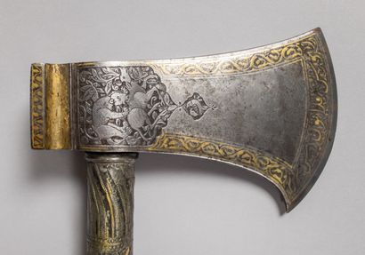 null Superb Persian tabarzin (battle axe). Symmetrical iron with chiseled decoration...
