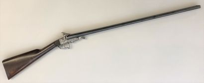 null Juxtaposed rifle in gauge 28 with pin. Mechanism with trunk and external hammers....